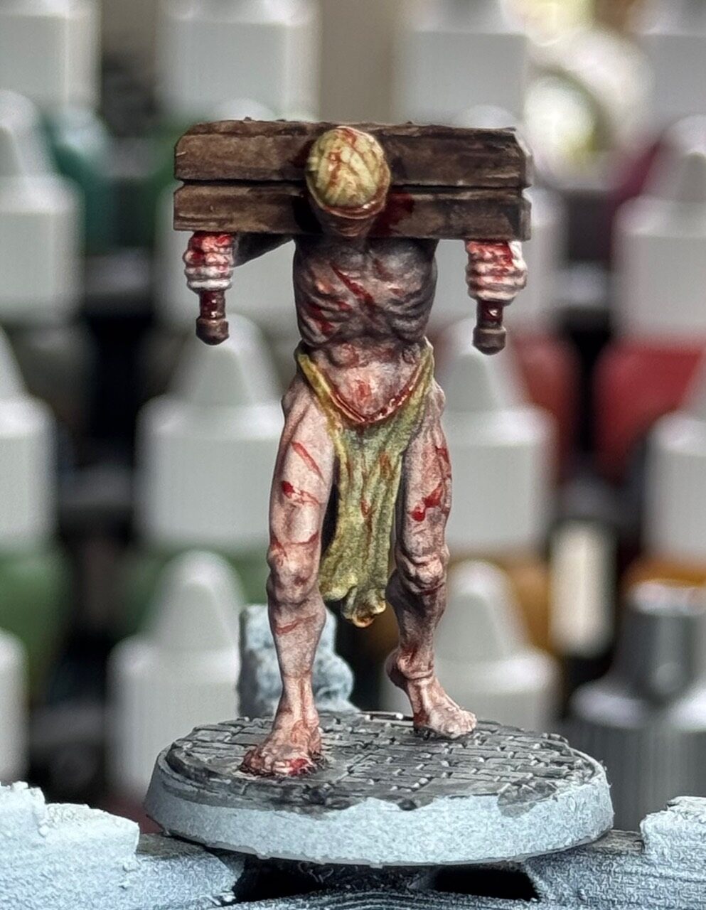 Black Oaths burdened captive miniature from the front