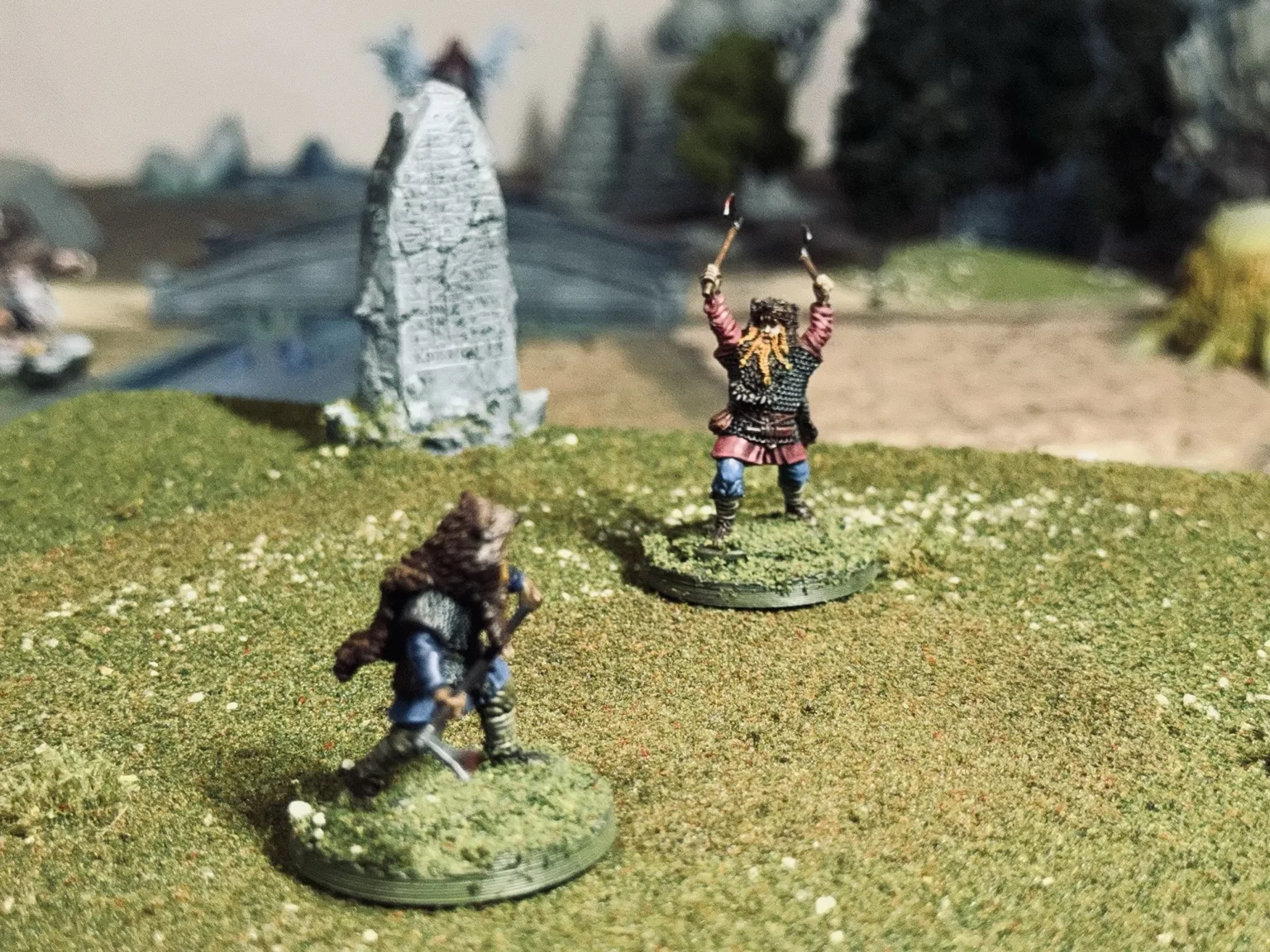 Black Oaths burdened captive miniature carrying a heavy plank from the front