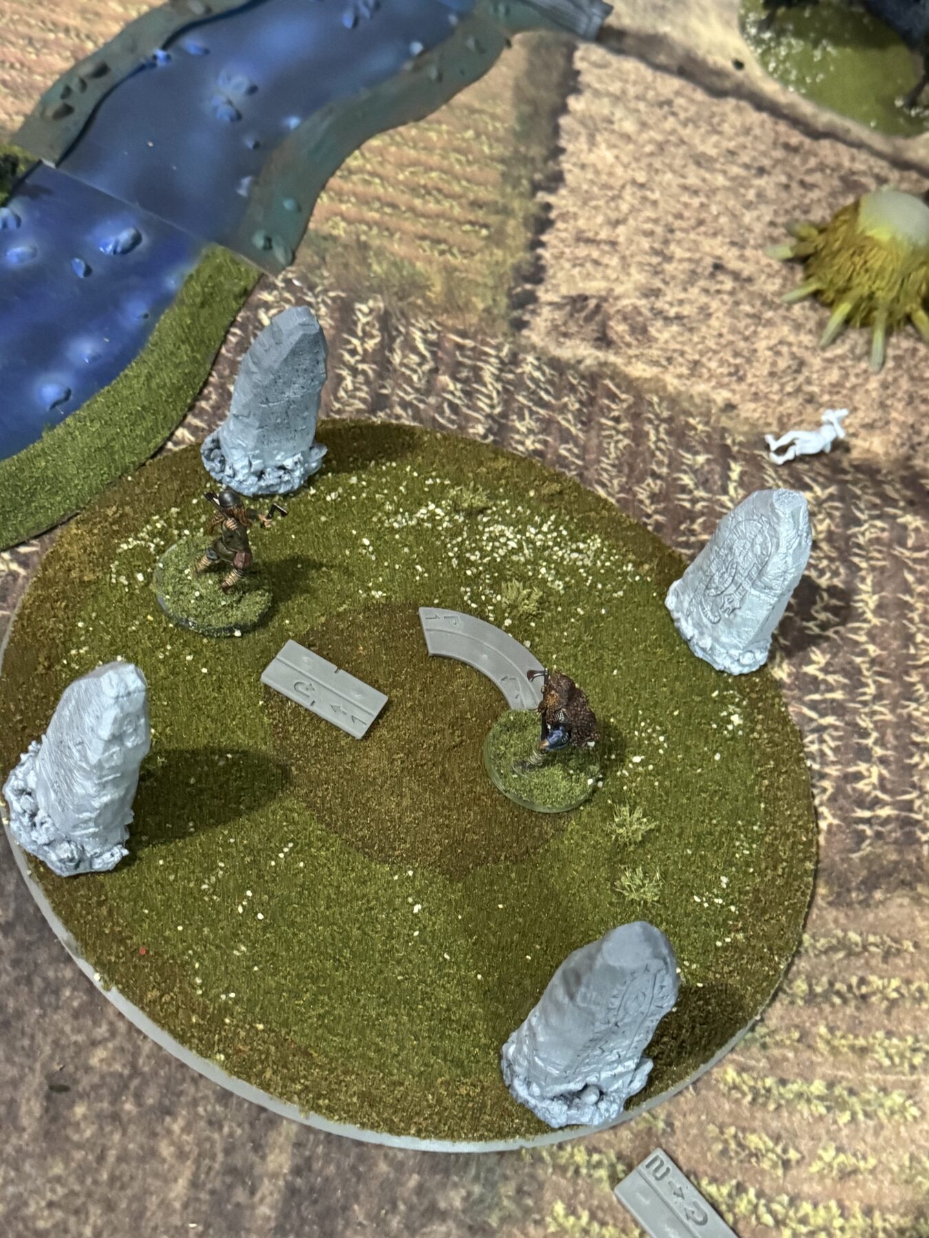 Overhead view of EINVIGI duel board and runestones