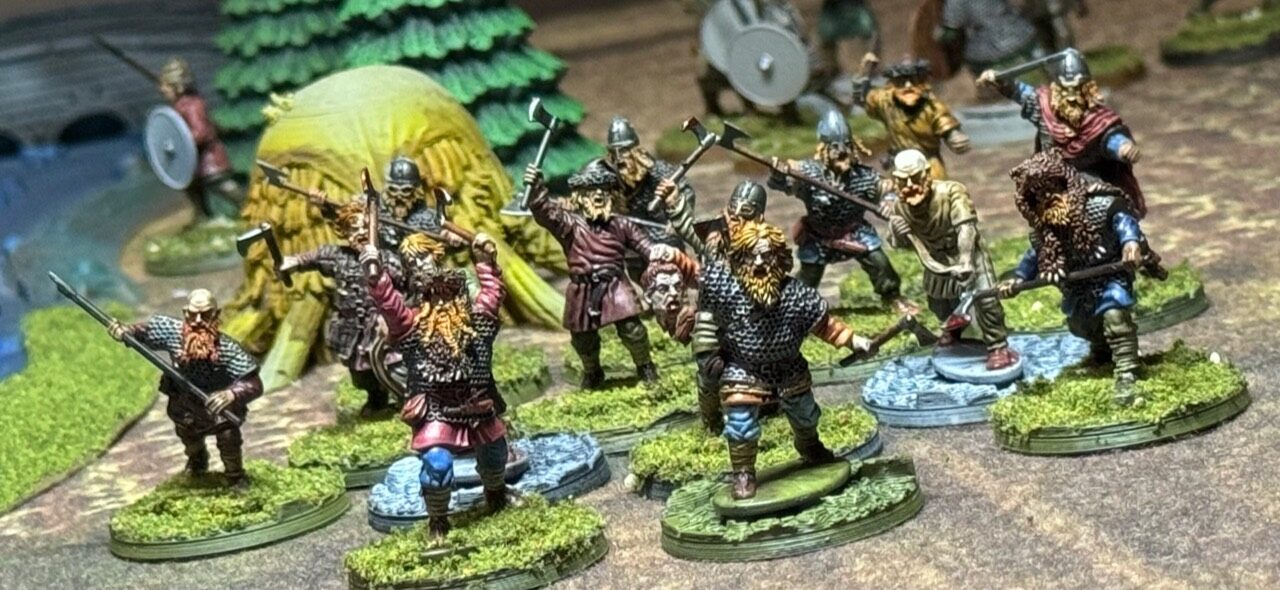 Oaths and Banners warriors advancing with axes and spears