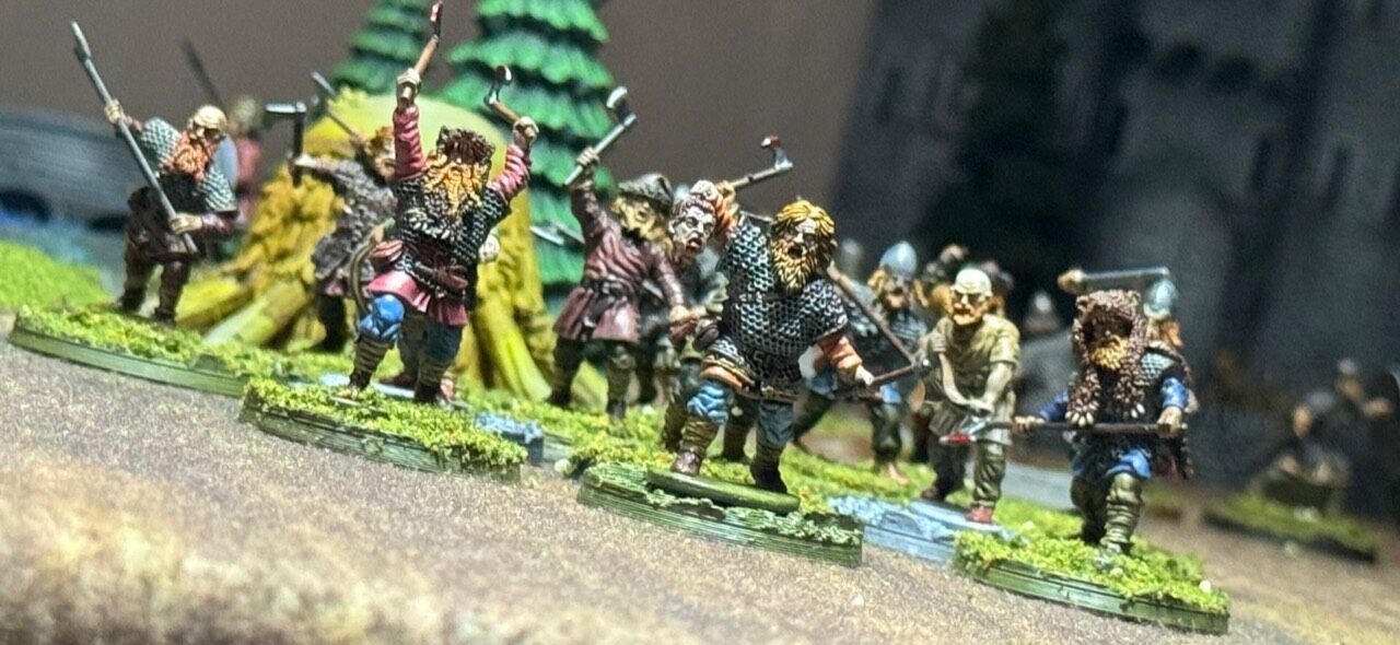 Oaths and Banners warriors charging across the field